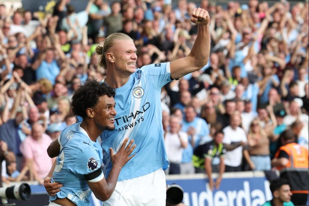Jogadores do Manchester City em ação